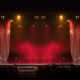 The Stage Of The Theater Illuminated By Spotlights From The