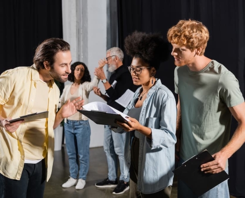 Acters reading scripts in acting classes in Brisbane